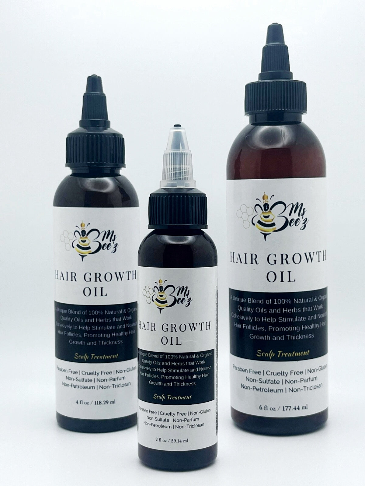 Ms. Beez Beauty hair growth oil in 2 oz, 4 oz, and 6 oz sized bottles